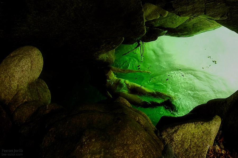 something underwater, under rocks...